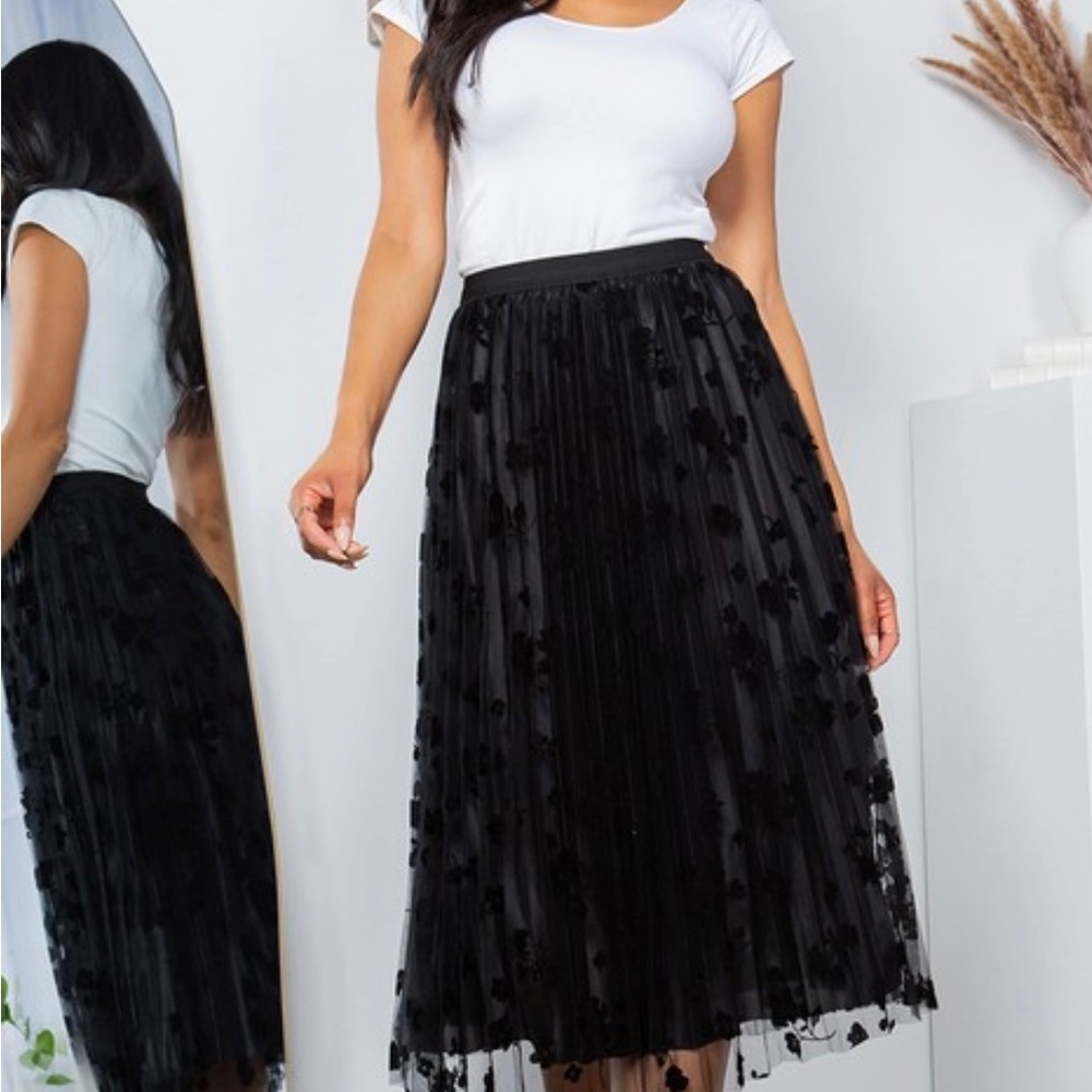 Black skirt with mesh outlayer